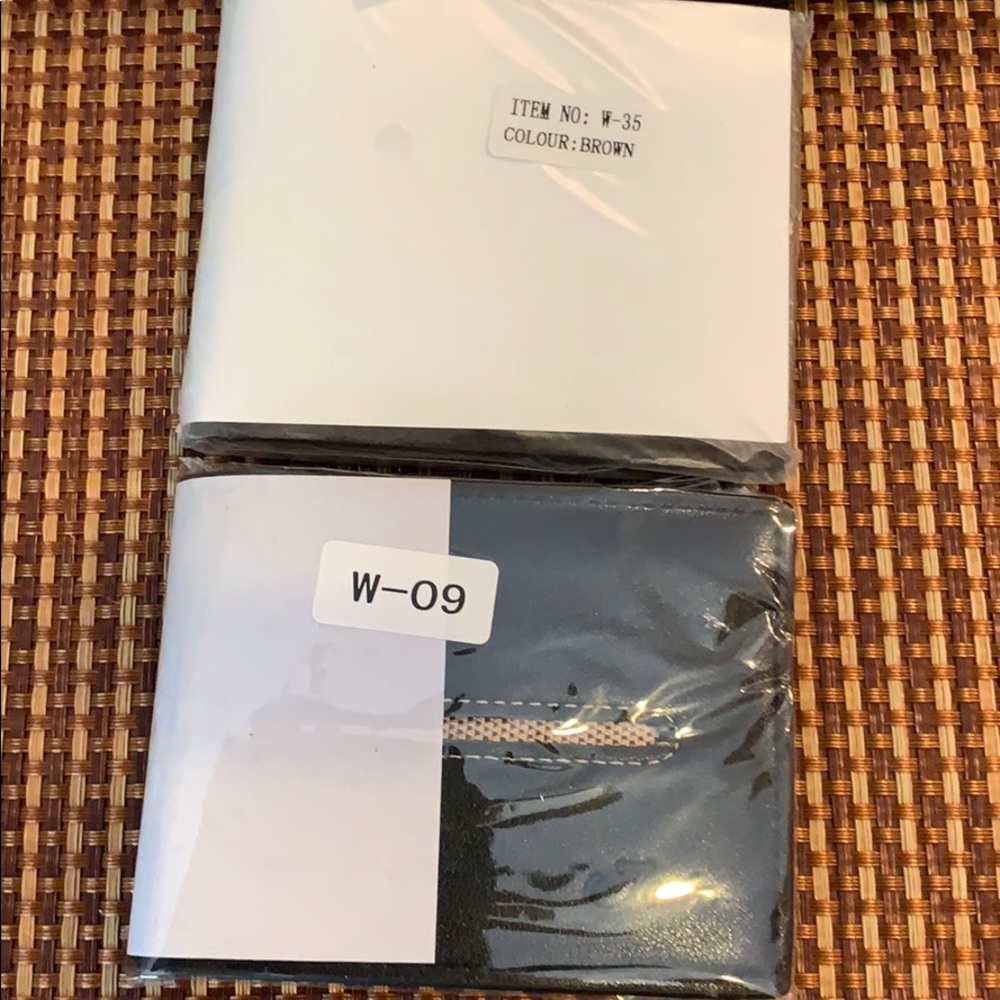 Teeth wallets NWT black or brown